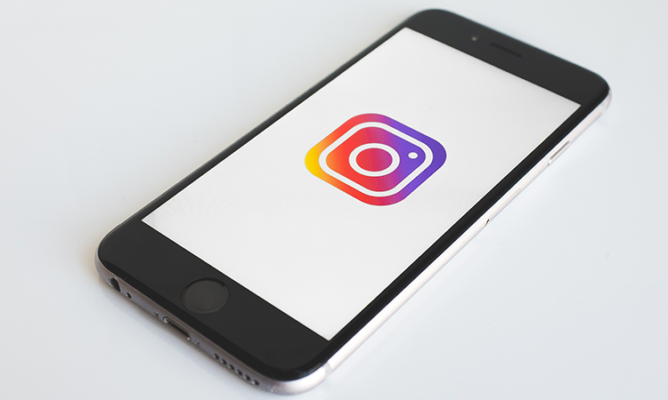 A phone displaying Instagram logo